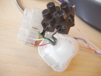 Image showing the rear of the cam housing, with the loose wires coming out of the flexible stalk connected to terminal blocks